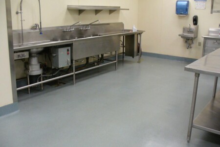 Closeup of Resinous Flooring application in industrial kitchen