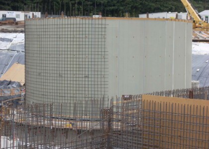 Reinforcing industrial plastic liner with rebar