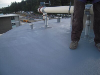 Leewens Corporation can spray your roof with a high-quality roof coating