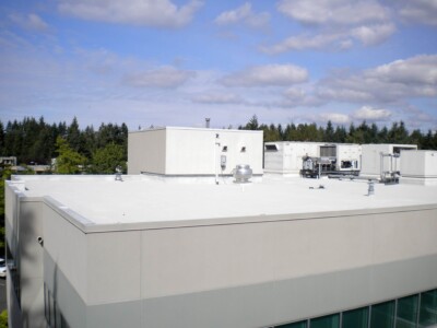 Commercial building with a white roof coating